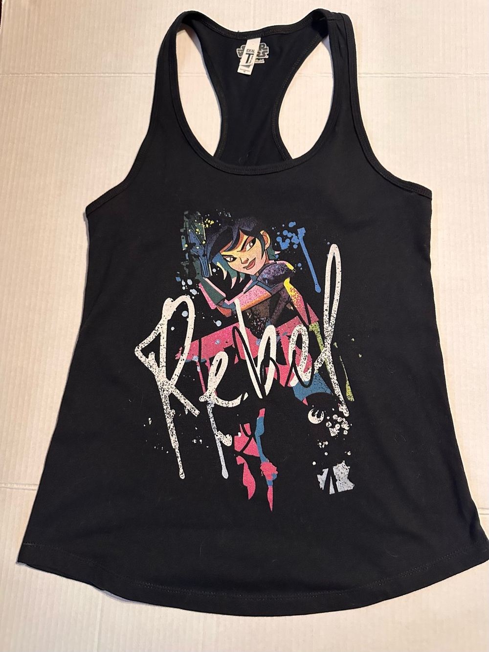Star Wars Forces of Destiny Sabine Wren paired w stylized “Rebel” graffiti text